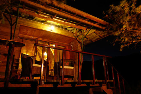 Deck overlooking river and forest shire-eco-lodge-deck